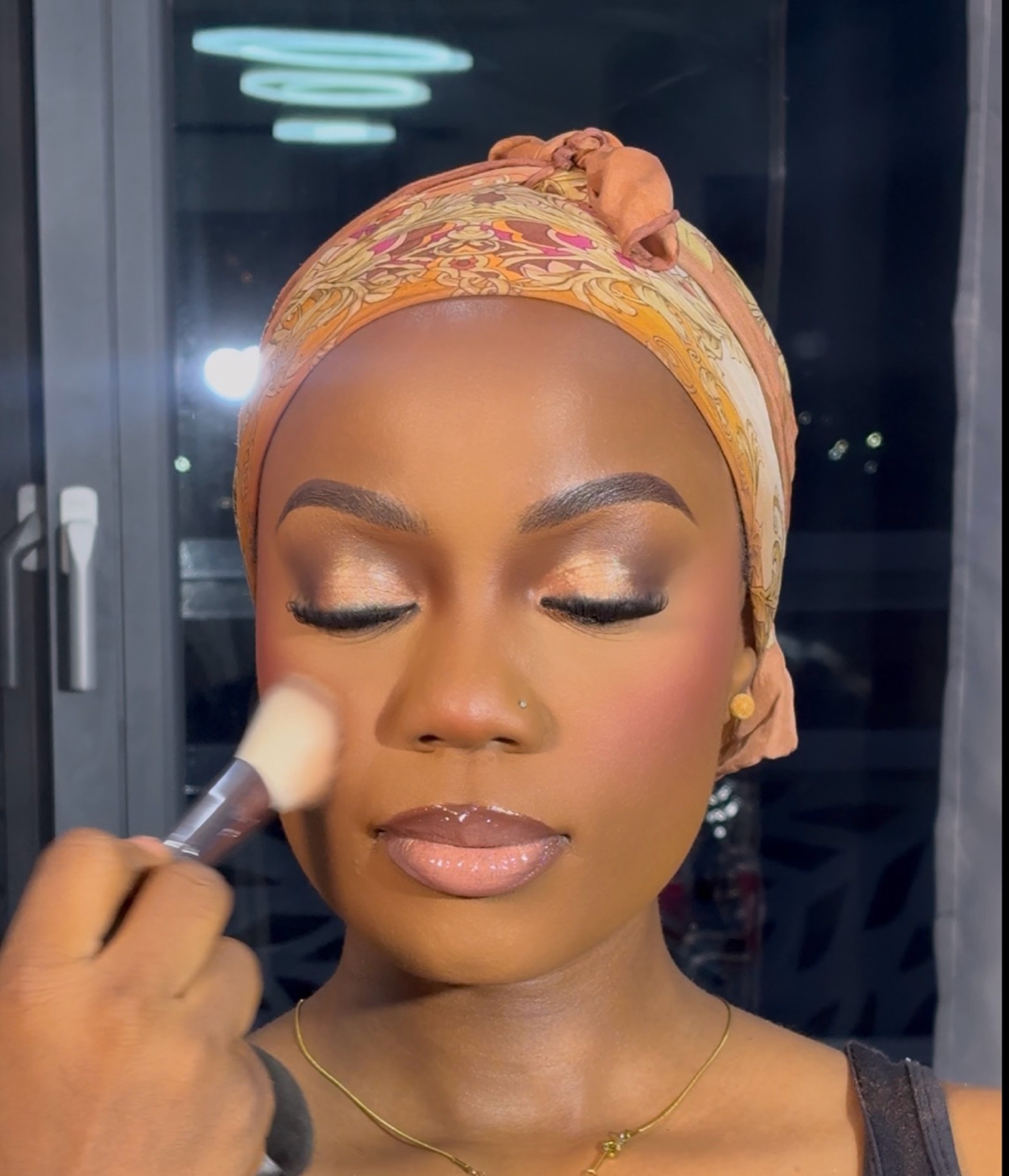 Authentic CINDY O STUDIOS makeup application during a professional beauty session